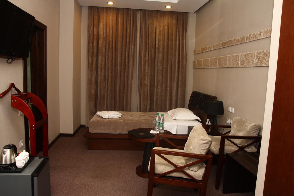 Grand M Hotel Navoi Quarto foto