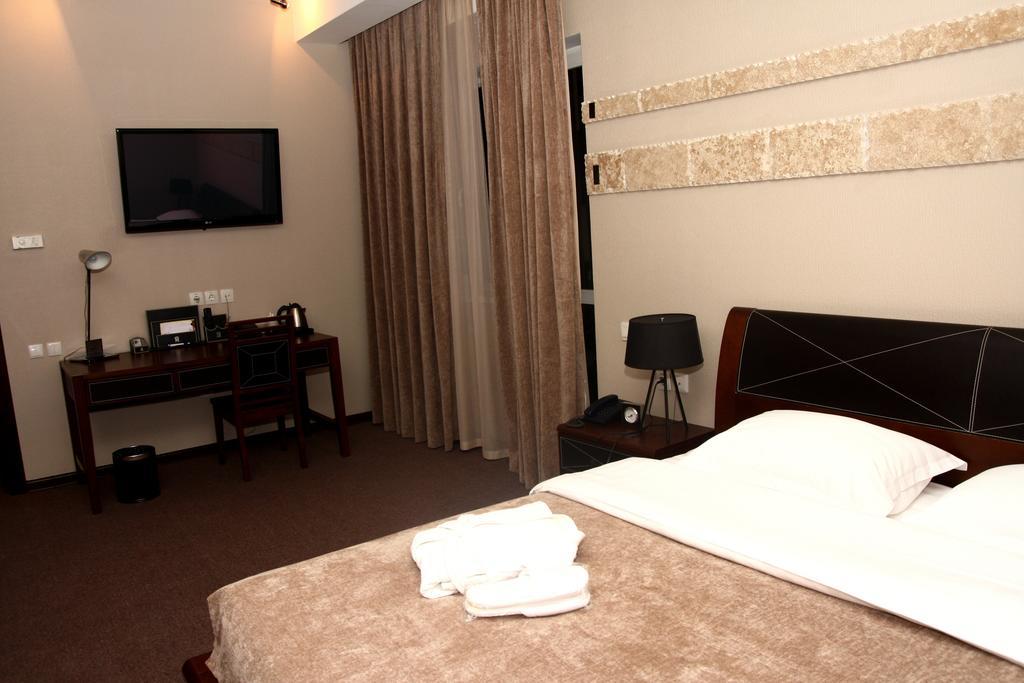 Grand M Hotel Navoi Quarto foto