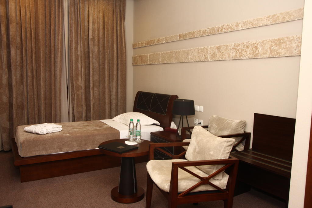 Grand M Hotel Navoi Quarto foto