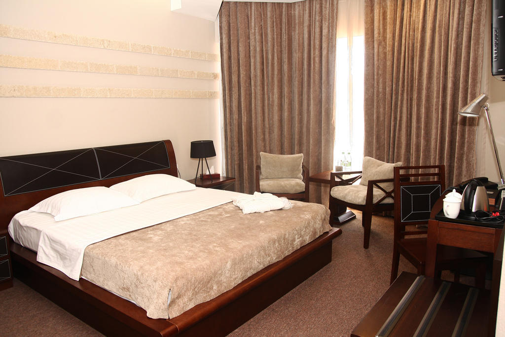 Grand M Hotel Navoi Quarto foto