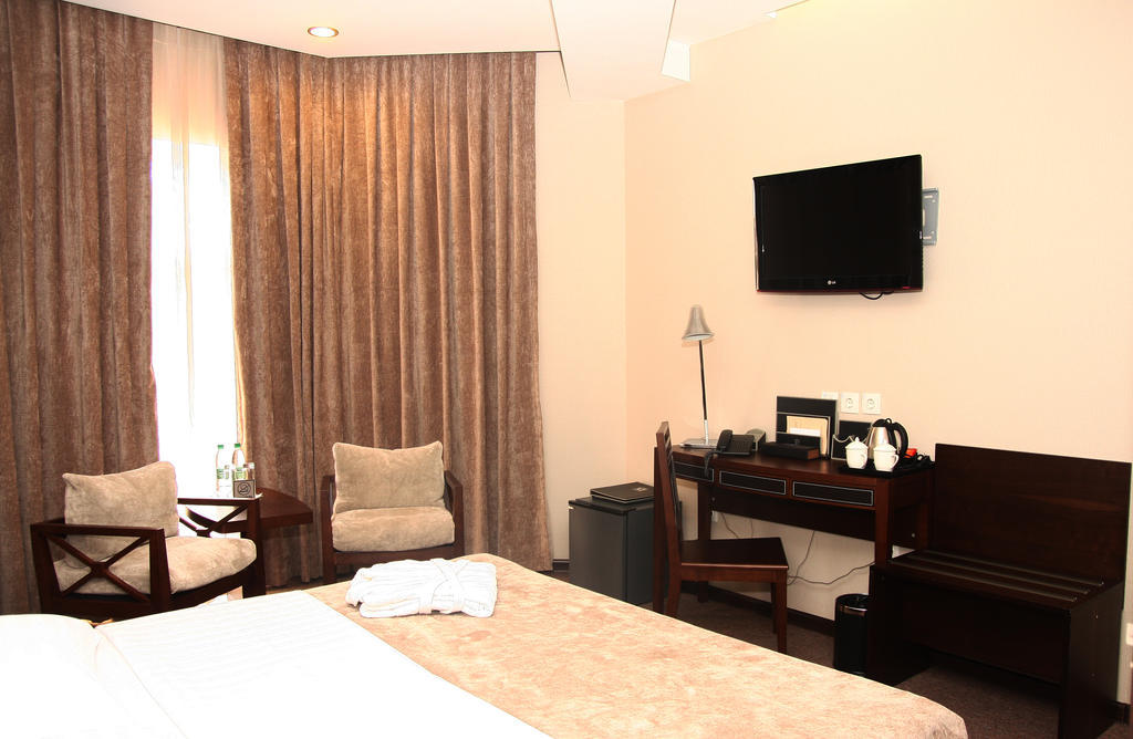 Grand M Hotel Navoi Quarto foto