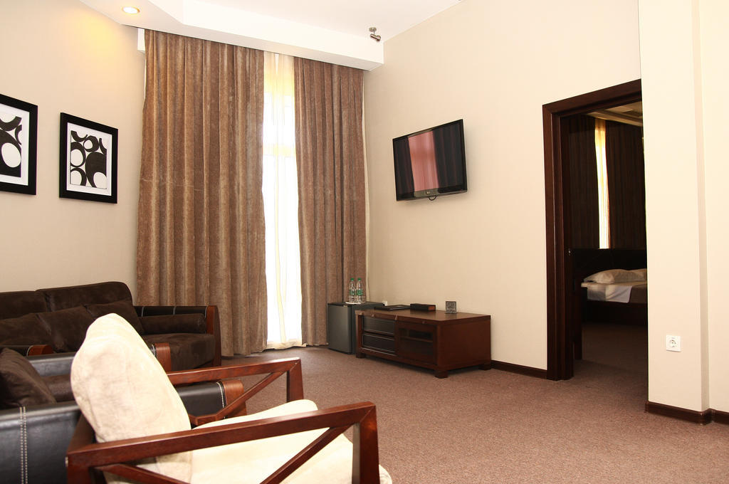 Grand M Hotel Navoi Quarto foto