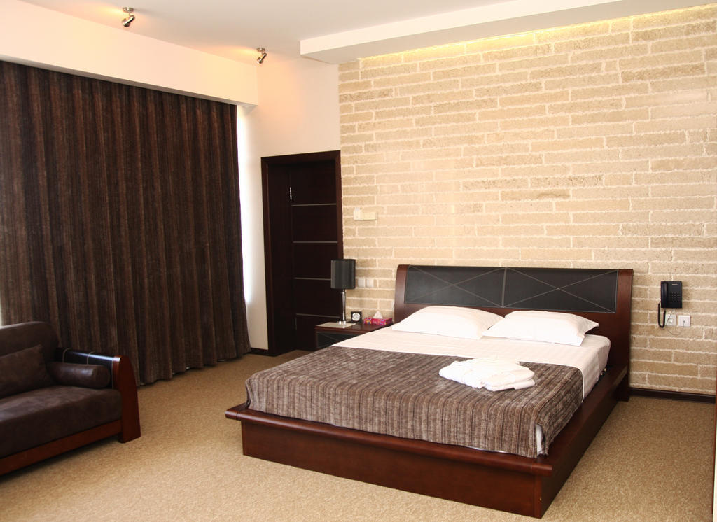 Grand M Hotel Navoi Quarto foto